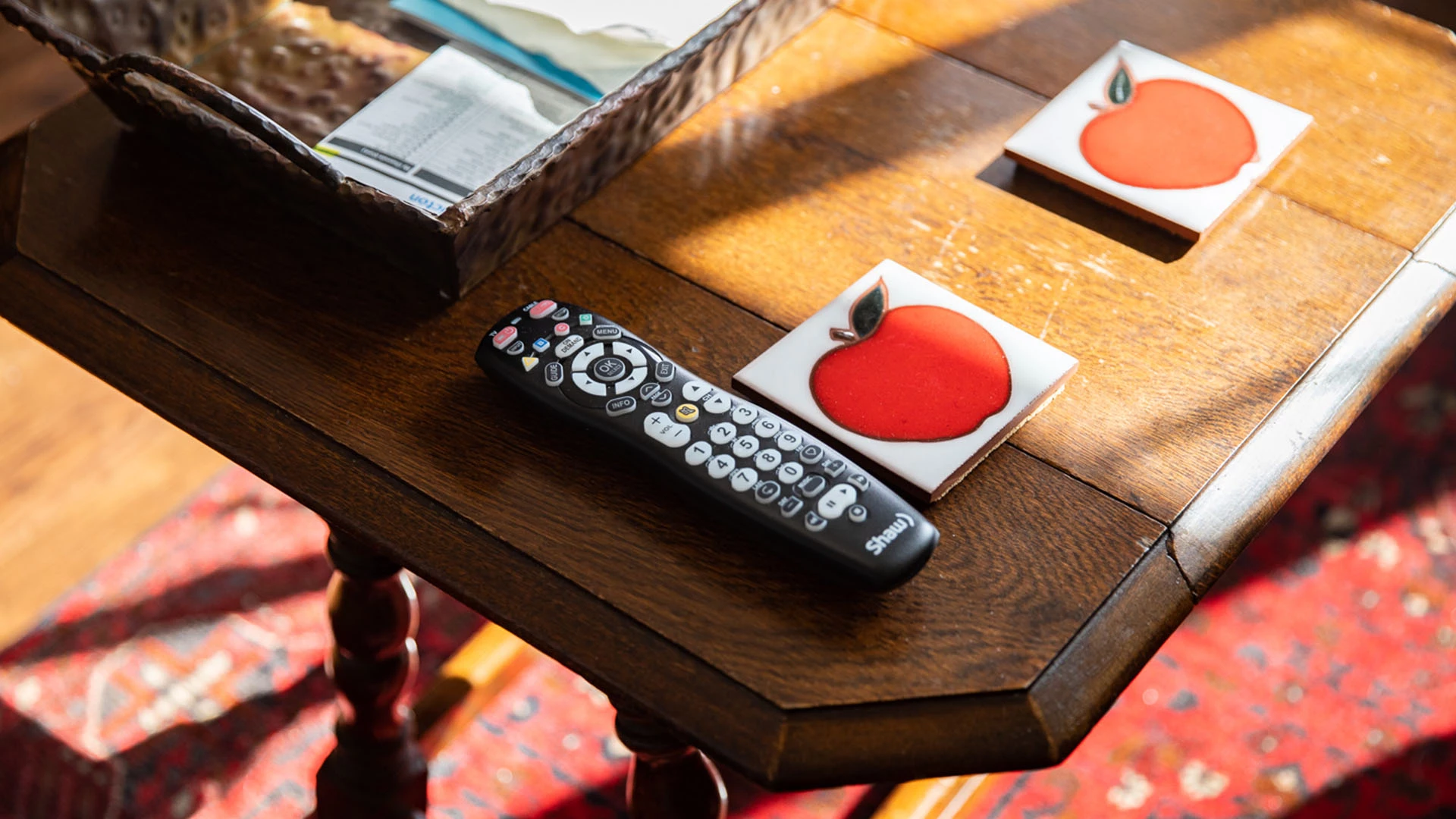 A TV remote on a table